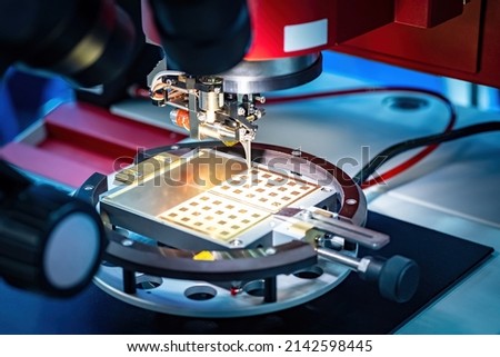 Manufacturing micro transistors. Production microcircuit boards close-up. Microchip manufacturing. PCB technology. Manufacture of microprocessors under microscope. Automatic PCB Production Equipment