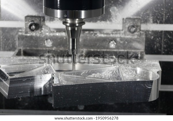 Manufacturing process with a CNC milling machine.\
Selective focus.