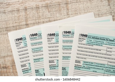 Many 1040 Tax Form. Tax Concept