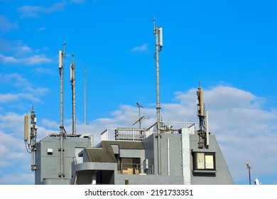 Many antennas installed on the roof of the building. Summer blue sky background. Tokyo Japan. - Shutterstock ID 2191733351