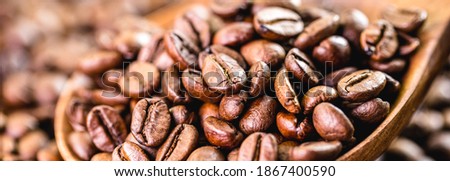 many arabica coffee seeds, macro detail image. Export-type Brazilian coffee, concept of rising coffee prices in Brazil