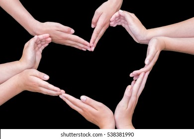 Many Arms And Hands Of Teenagers Making Heart Shape Isolated On Black Background