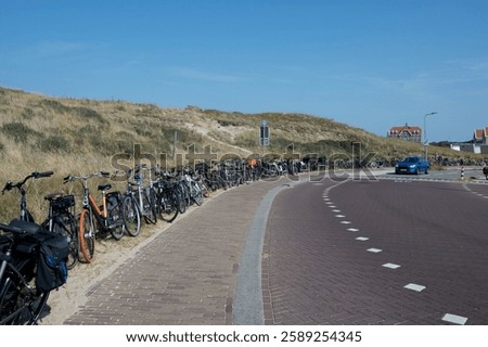 Similar – Image, Stock Photo Many bicycles parked at a public bike rack in Copenhagen