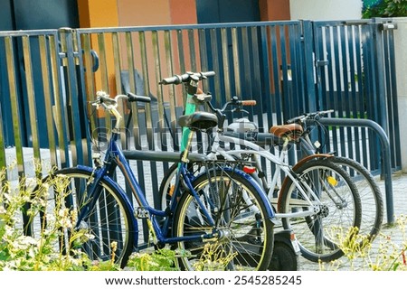 Similar – Image, Stock Photo Many bicycles parked at a public bike rack in Copenhagen