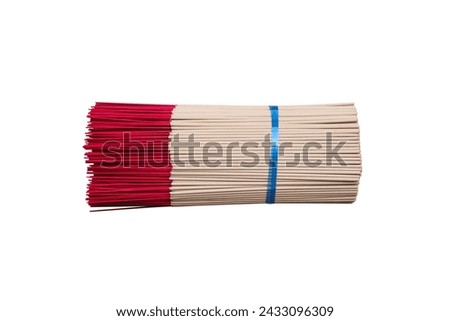 Many big aromatic incense sticks tied with blue plastic rope on white background , clipping path