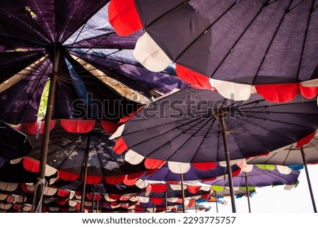 Many big umbrellas on the beach