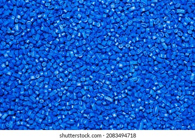 Many bight blue  granules of polypropylene, polyamide. Background. Plastic and polymer industry, industry. Microplastic products.