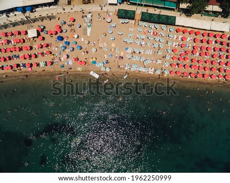 Similar – Luftballonaufnahme von Menschen, die Spaß und Entspannung am Costinesti-Strand in Rumänien am Schwarzen Meer haben.