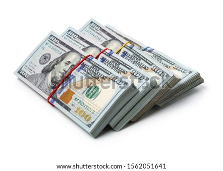 Many bundle of US 100 dollars bank notes isolated on white background 