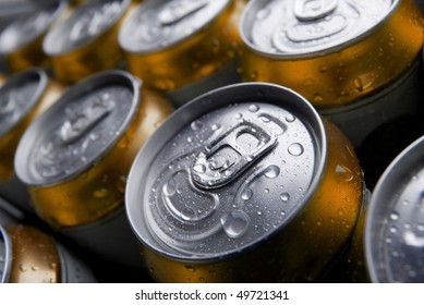 Many Cans Of Cold Beer With Condensation Water Droplets