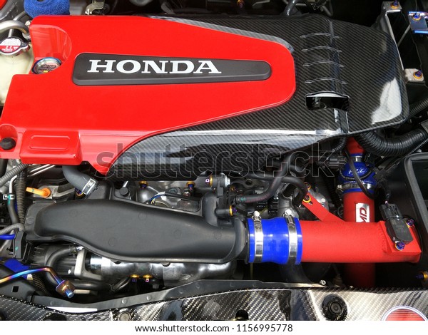 Many car accessories in\
Honda car engine decorations at show room in Bangkok, Thailand,\
08/15/2018