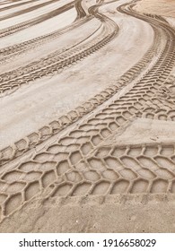 Many Car Tire Tracks In The Sand, No Person