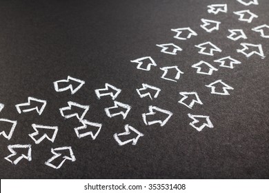 Many Chalk Arrows Move In The Same Direction