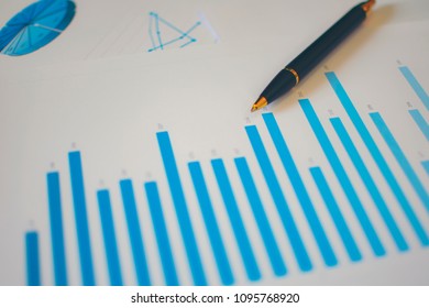 Many Charts And Glasses. Reviewing Data. Financial Reports And Glasses. Reflection Background.