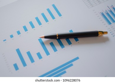 Many Charts And Glasses. Reviewing Data. Financial Reports And Glasses. Reflection Background.