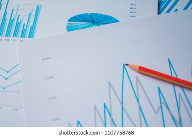 Many Charts And Glasses. Reviewing Data. Financial Reports And Glasses. Reflection Background.