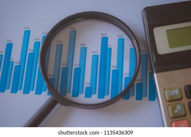 Many Charts And Glasses. Reviewing Data. Financial Reports And Glasses. Reflection Background.