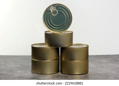 Many closed tin cans on white background. metal cans for fish and meat products - Shutterstock ID 2219618881