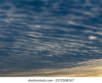 Many clouds in the blue sky