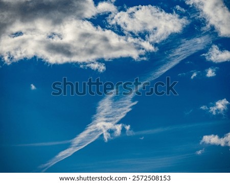 Many clouds in the blue sky