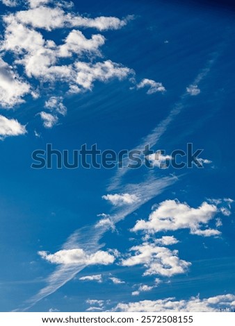 Many clouds in the blue sky