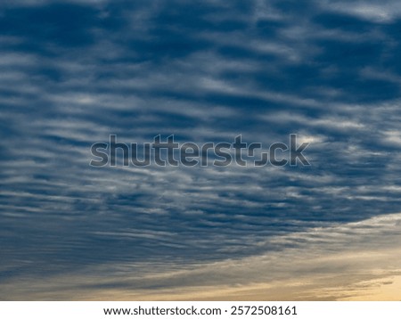 Many clouds in the blue sky