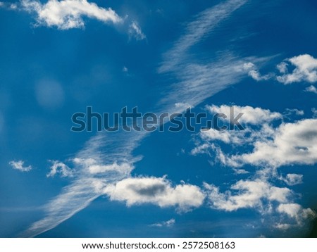 Many clouds in the blue sky