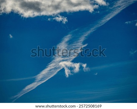 Many clouds in the blue sky
