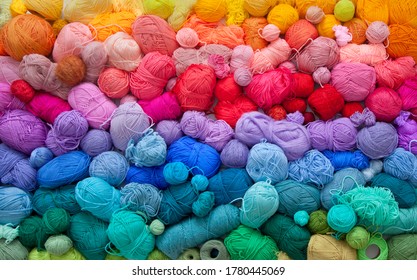 Many colorful balls wool   cotton yarn for knitting  White background  Stretch   gradient  Rainbow layout 