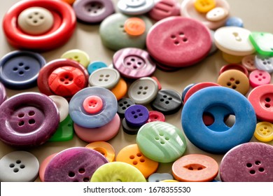 Many colorful garment buttons in various shapes and sizes - Shutterstock ID 1678355530