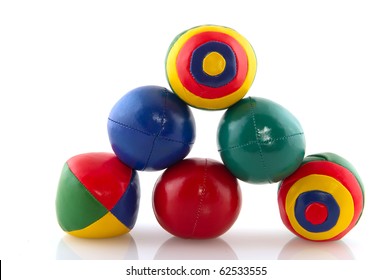 Many Colorful Juggle Balls With Stripes Isolated Over White