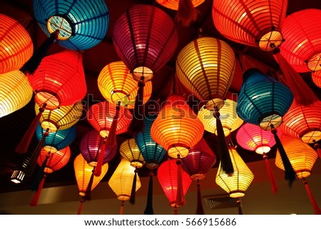 many colorful paper lanterns on ceiling stock photo edit now