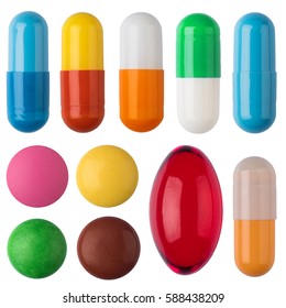 Many colorful pills and tablets isolated on white. - Shutterstock ID 588438209