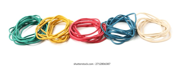 Many colorful rubber bands isolated on white
