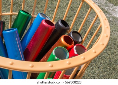 Many Colorful School Baton Of Running Preparing In A Basket For Running Competition. Running Sport Equipment Concept.