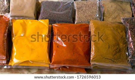 Many colorful spice bags at market in Seychelles