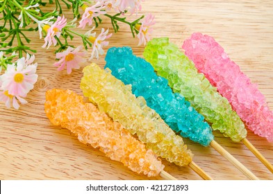 Many Colorful Sugar Crystal Candy On Wooden Stick