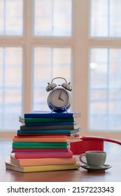 Many Colorful Textbooks Are Placed On  Desk In Study Room As They Are Prepared For Students To Review Learn And Understand Lesson Before Taking The Final Exam. Concept Of Learning And Understanding