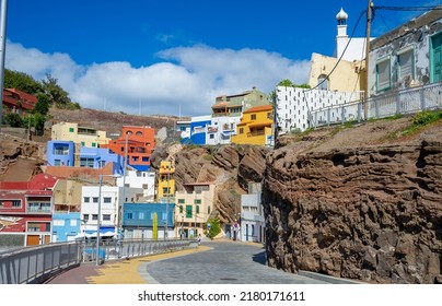 Many Colourful Houses On Canary Island Roads Built On Volcanic Rock And Sought After By Many Tourists