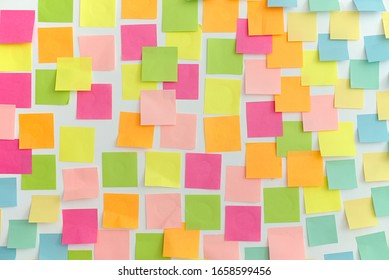 Many of colourful memory stickers on a white background. Pattern, Texture, Decoration Theme. Busy day, business concept. - Powered by Shutterstock