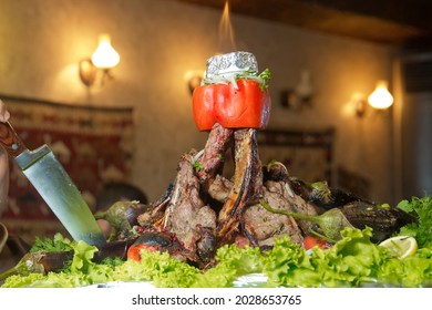 Many Cooking Traditional Azerbaijan asting lamb barbecues.Roasted meat over an open fire, cooked in a special way.Barbecue is prepared of lamb or sheep meat and processed by slasher. Eggplant stuffing