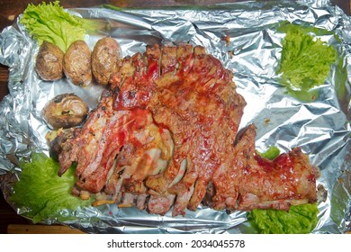 Many Cooking Traditional Azerbaijan asting lamb barbecues.Roasted meat over an open fire, cooked in a special way.Barbecue is prepared of lamb or sheep meat and processed by slasher. potato kebab