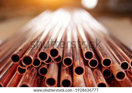 Many copper pipes, warehouse copper plates. close up