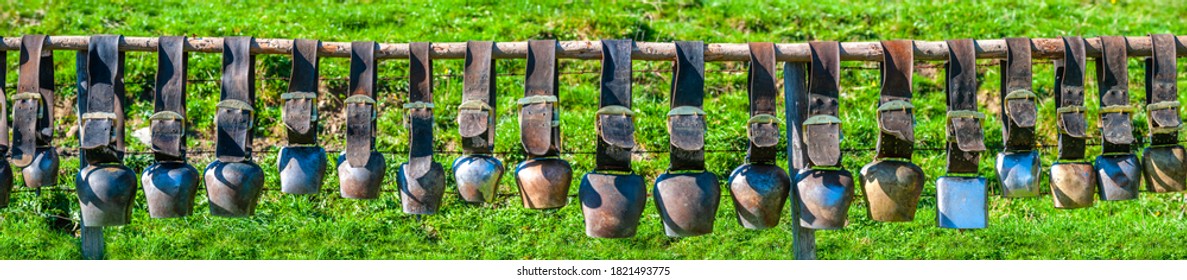 Many Cow Bells Hanging In A Row