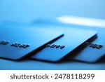 Many credit cards on blurred background, closeup