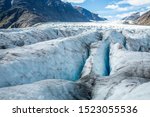 The many crevasses on the surface of the Salmon Glacier make travel up glacier very slow and dangerous. The Glacier sits near Hyder, Alaska just over the border in remote British Columbia, Canada.