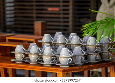 Many cups set on table for coffee break lunch in the hotel or restaurant during conference meeting, banquet, wedding or birthday party