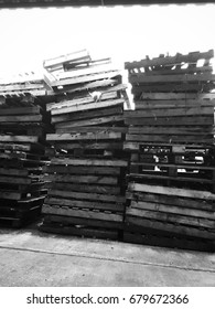 Many Damaged Pallets Come Together To Await Destruction.