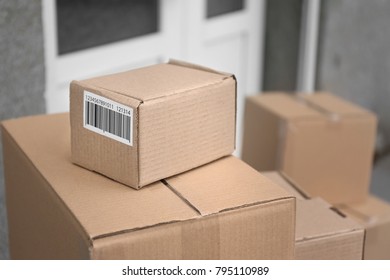 Many delivered parcels outdoors, closeup - Shutterstock ID 795110989