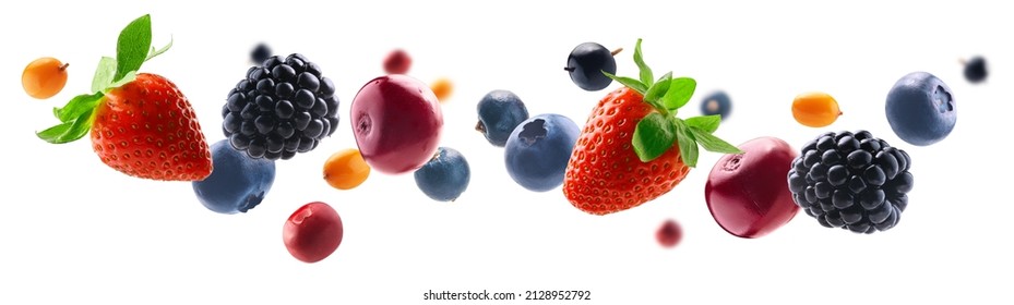 Many different berries in the form of a frame on a white background